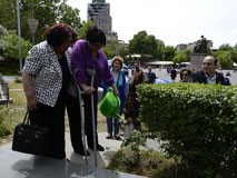 Planting Roses Around Alexander Spendiaryan's Grave