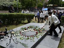 Planting Roses Around Alexander Spendiaryan's Grave